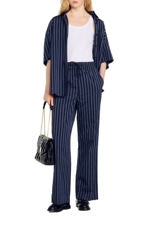 Shop Sandro Striped Trousers In Blue