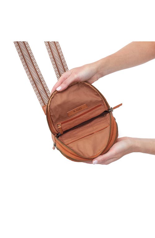 Shop Hobo Cass Leather Sling Bag In Butterscotch