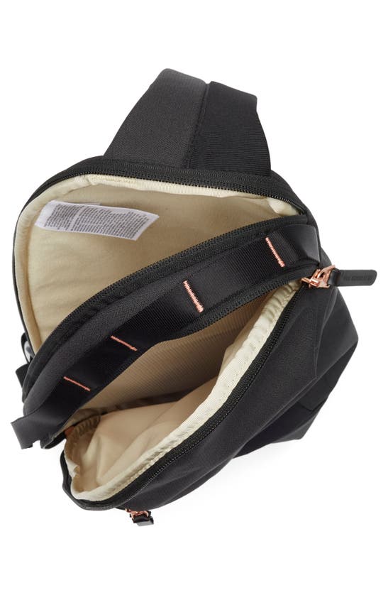 Shop The North Face Isabella Water Repellent Sling Bag In Black Light Heather/coral