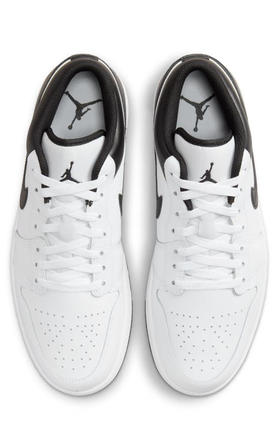 Shop Jordan Air  1 Low Sneaker In White/ Black/ White