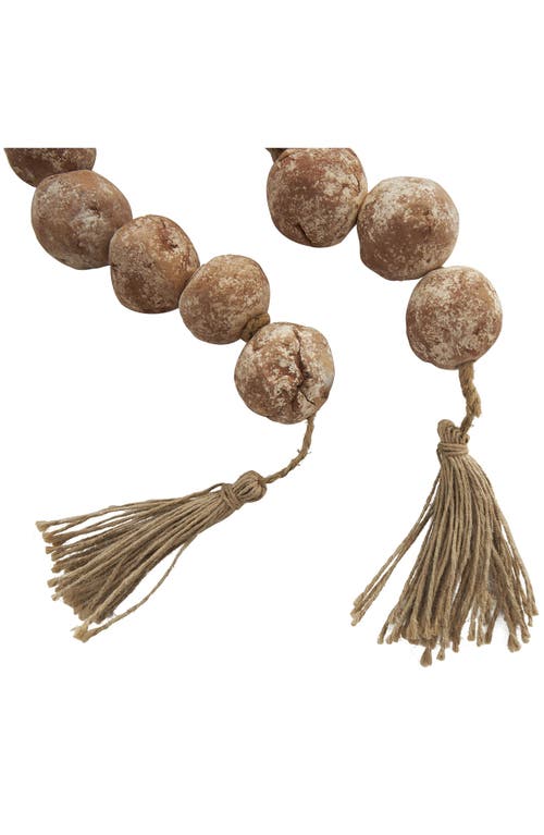 Willow Row Ceramic & Tassel Garland In Brown