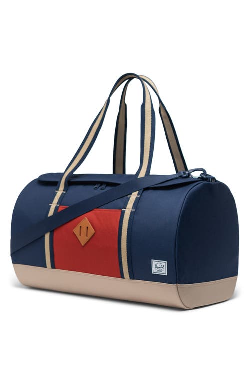 Shop Herschel Supply Co . Heritage Duffle Bag In Black Iris/red Ochre/twill