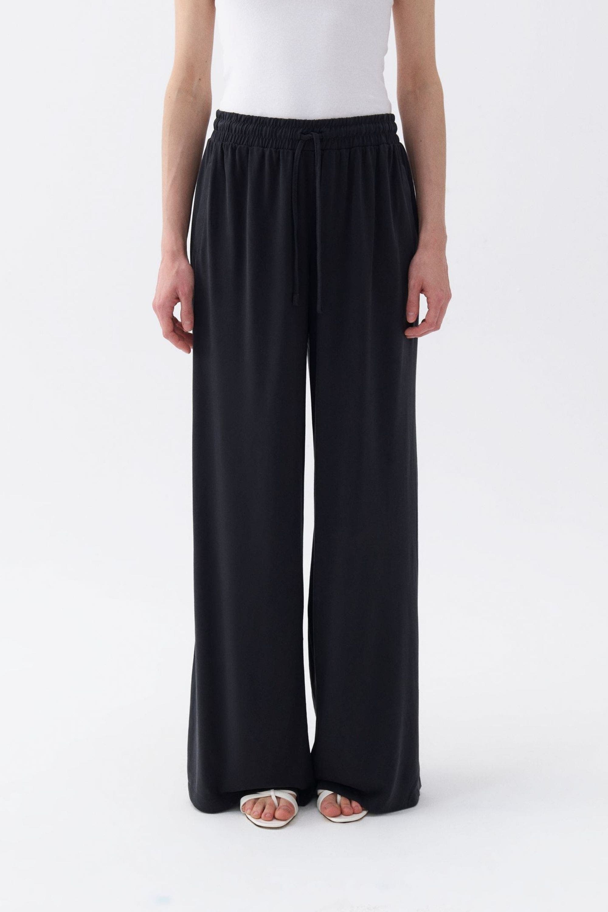 Nocturne Loose Fit Wide Leg Pants in Black Cover