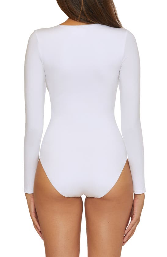 Shop Trina Turk Monaco Long Sleeve One-piece Swimsuit In White