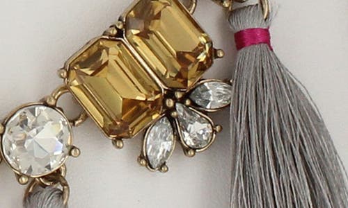 Shop Olivia Welles Tassel Bib Necklace In Gold/grey