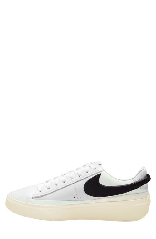 Shop Nike Blazer Phantom Low Sneaker In White/black/white