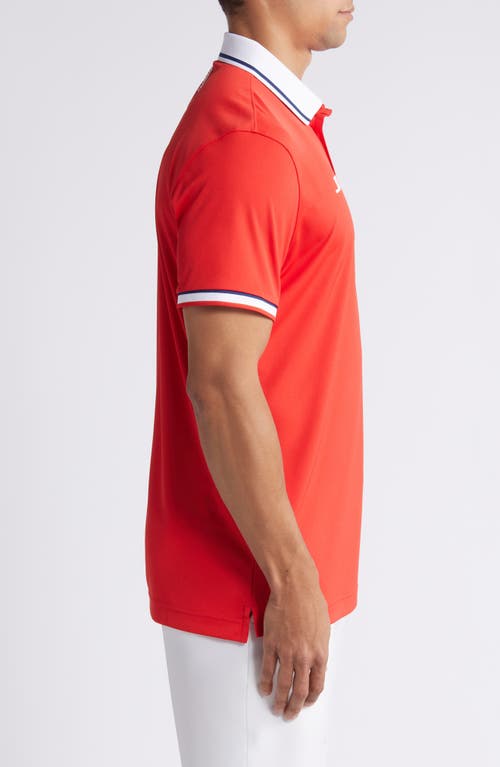 Shop J. Lindeberg Timeo Golf Polo In Flame Scarlet