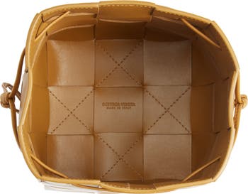 Bottega Veneta® Mini Cassette Bucket Bag in Porridge. Shop online now.