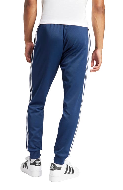 Shop Adidas Originals Adidas Adicolor Superstar Track Pants In Night Indigo