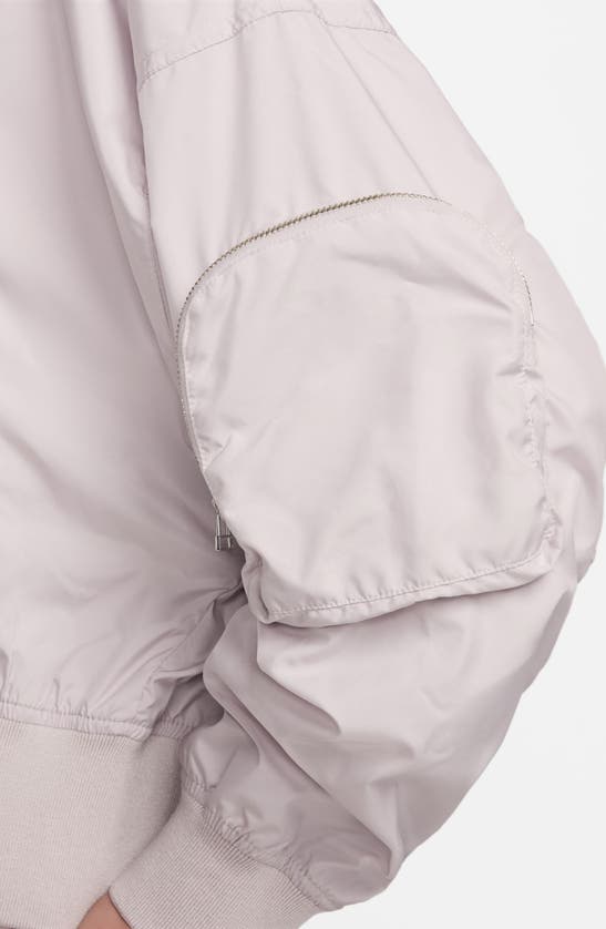 Shop Nike Sportswear Essentials Oversize Bomber Jacket In Platinum Violet/ Sail
