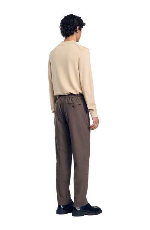 Shop Sandro Elasticated Waist Trousers In Taupe