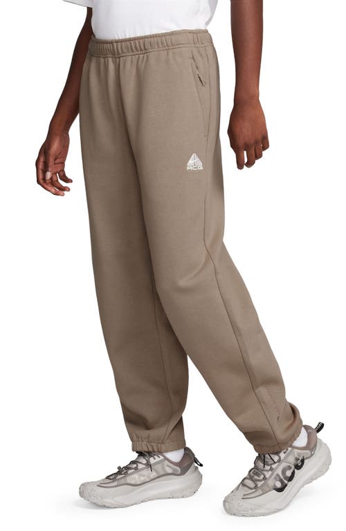 Shop Nike Acg Lungs Therma-fit Repel Tuff Fleece Pants In Khaki/light Iron Ore/white