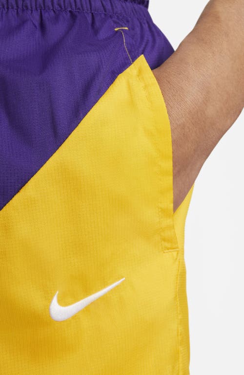 Shop Nike Dna Tie Waist Shorts In Court Purple/university Gold