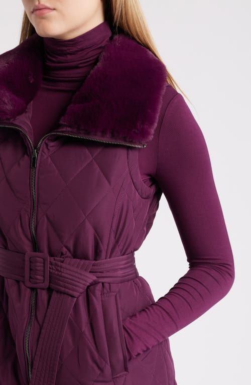 Shop Anne Klein Belted Zip Front Quilted Vest With Faux Fur Collar In Deep Plum