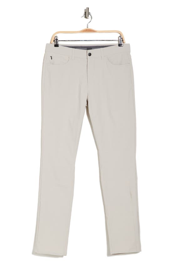 Shop Dkny Sportswear Essential Tech Stretch Pants In Pumice