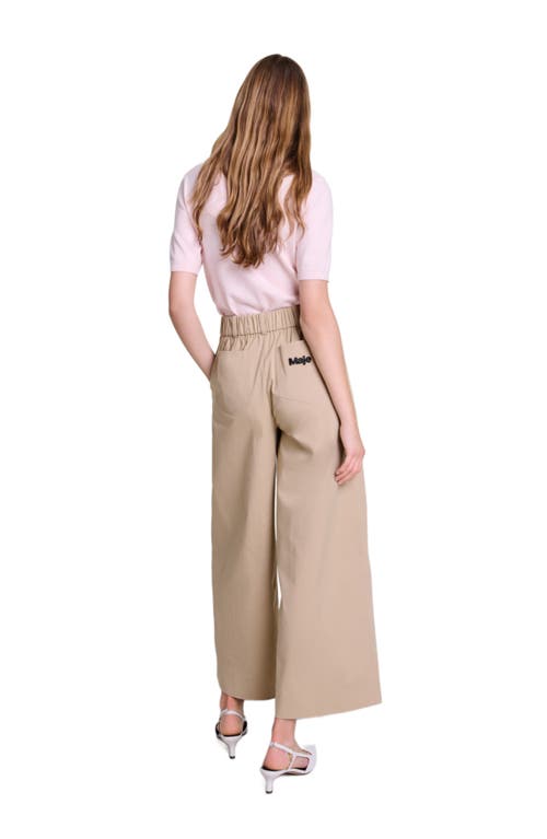 Shop Maje Wide-leg Cotton Trousers In Beige Light