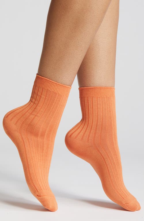 Her Socks in Tangerine