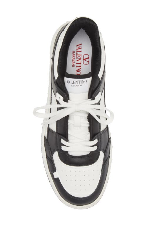 Shop Valentino Garavani Rockstud Low Top Sneaker In Bianco/nero