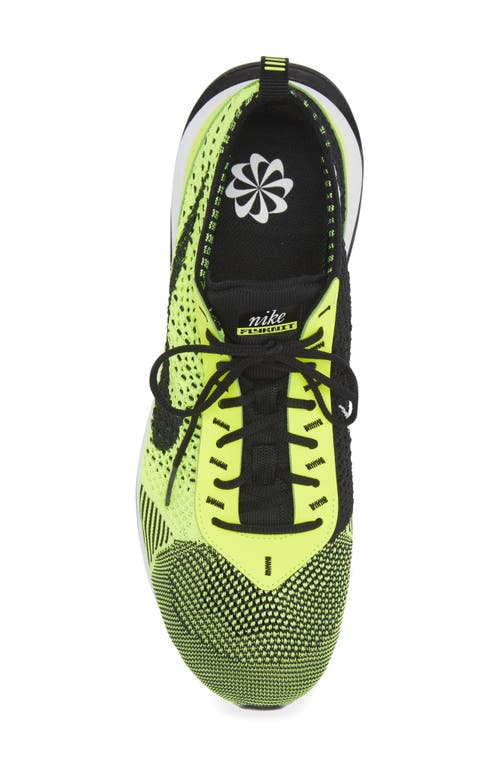 Shop Nike Air Max Flyknit Racer Sneaker In Volt/black/white