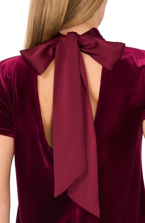 Cece Mock Neck Cutout Stretch Velvet Top In Majestic Wine