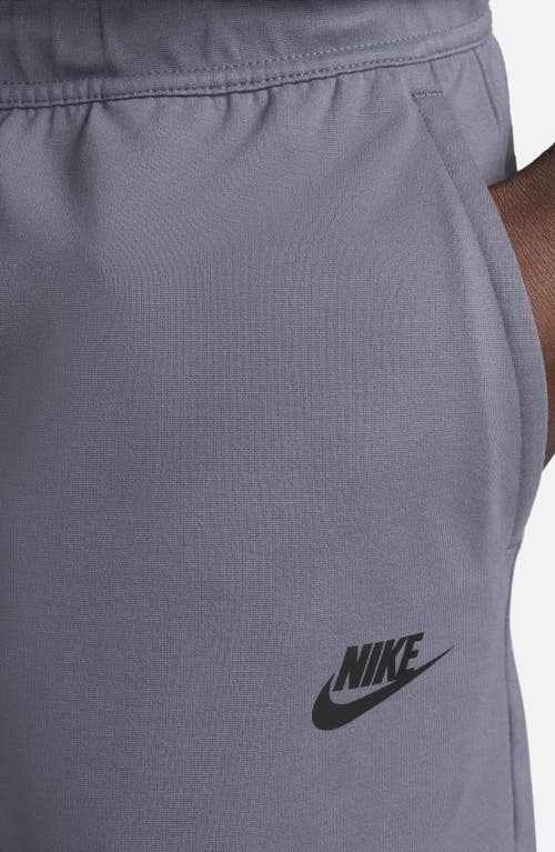 Shop Nike Lightweight Tech Knit Shorts In Light Carbon/black