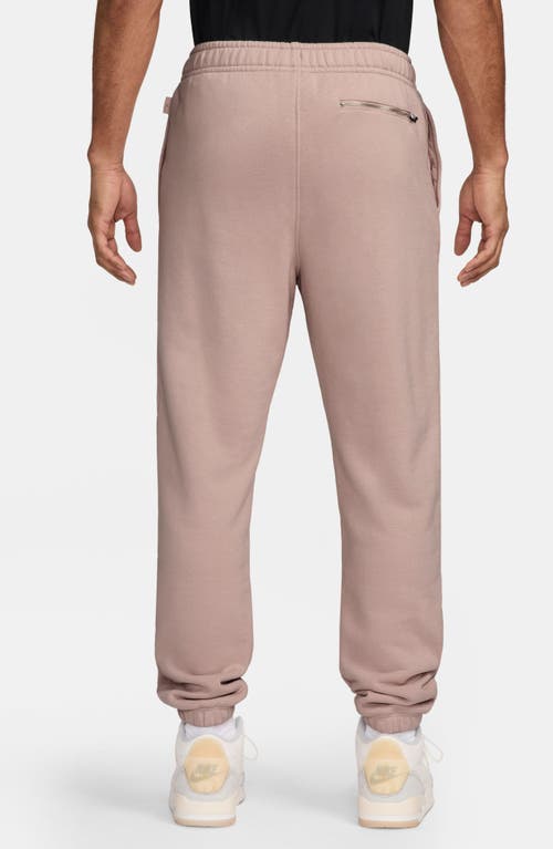 Jordan Wordmark Cotton Fleece Sweatpants In Pink Oxford