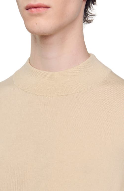 Shop Sandro Funnel Neck Sweater In Cream