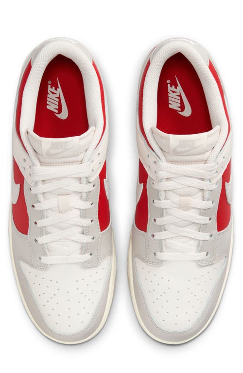 Shop Nike Dunk Low Retro Basketball Sneaker In Phantom/light Iron Ore/red