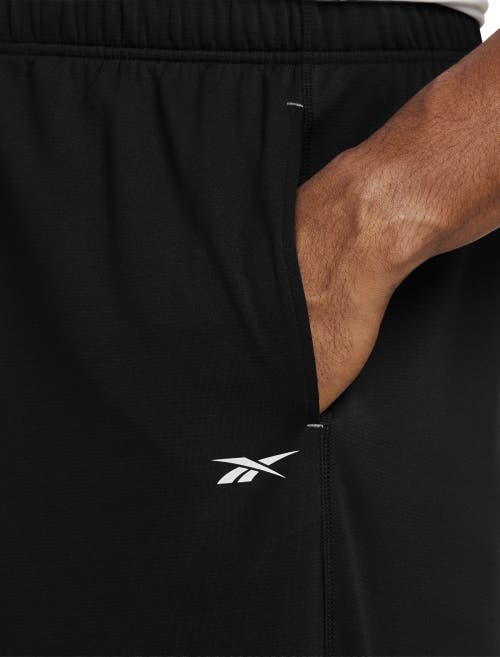 Shop Reebok Performance Jersey Elastic-hem Tech Pants In Black