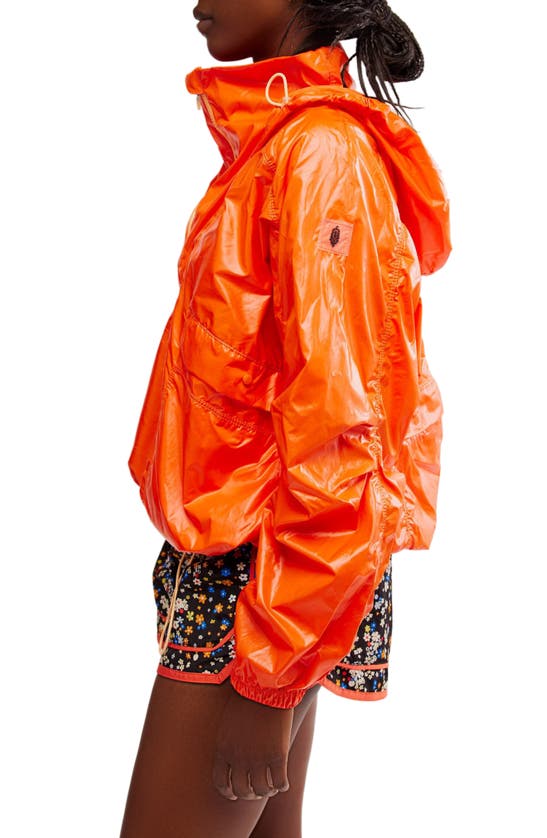 Shop Fp Movement Spring Showers Water Resistant Packable Rain Jacket In Heat Wave