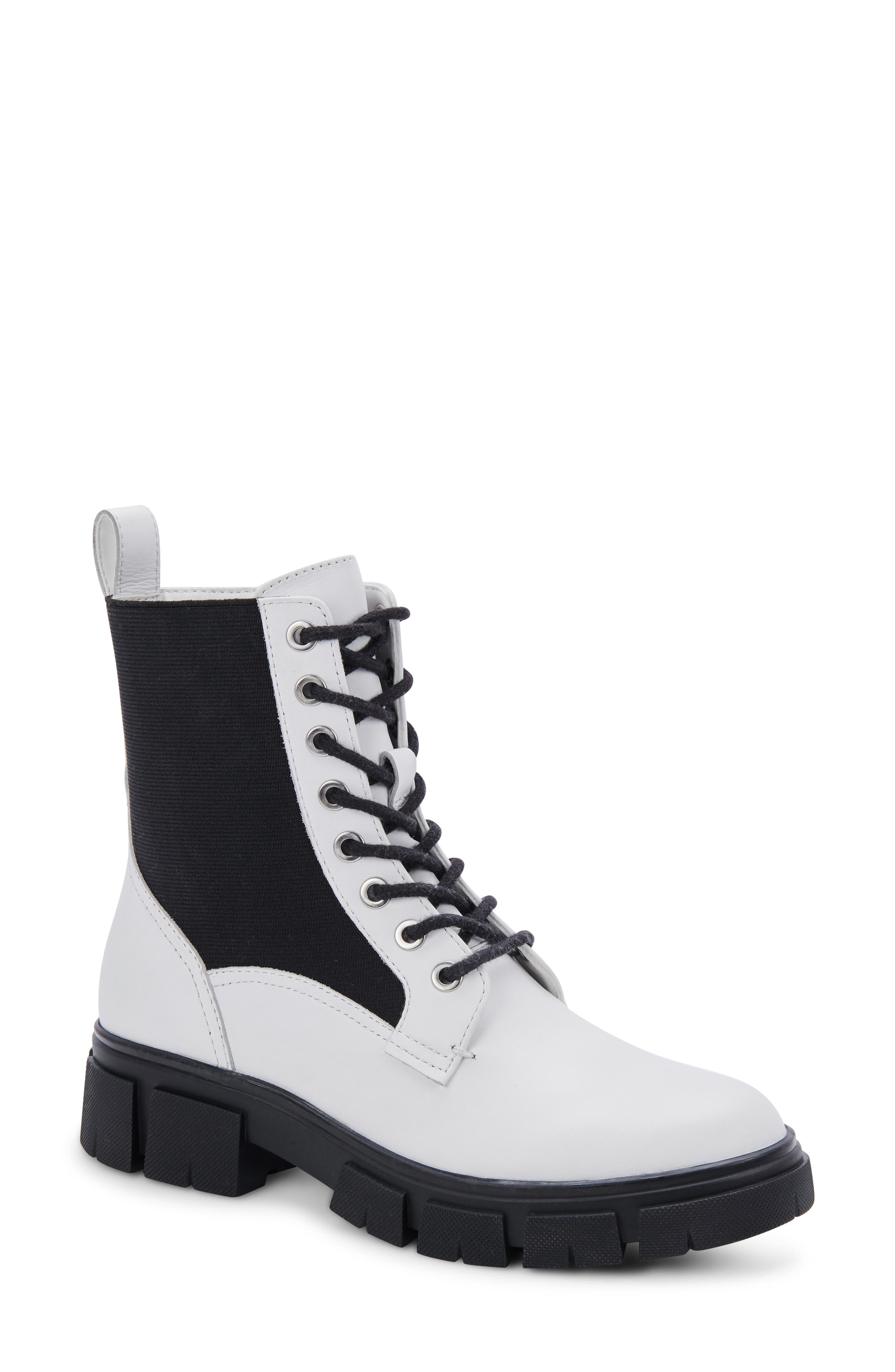 white boots with black bottoms