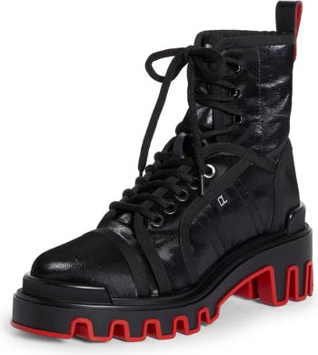 Lacquered women's black work boots with a red sole