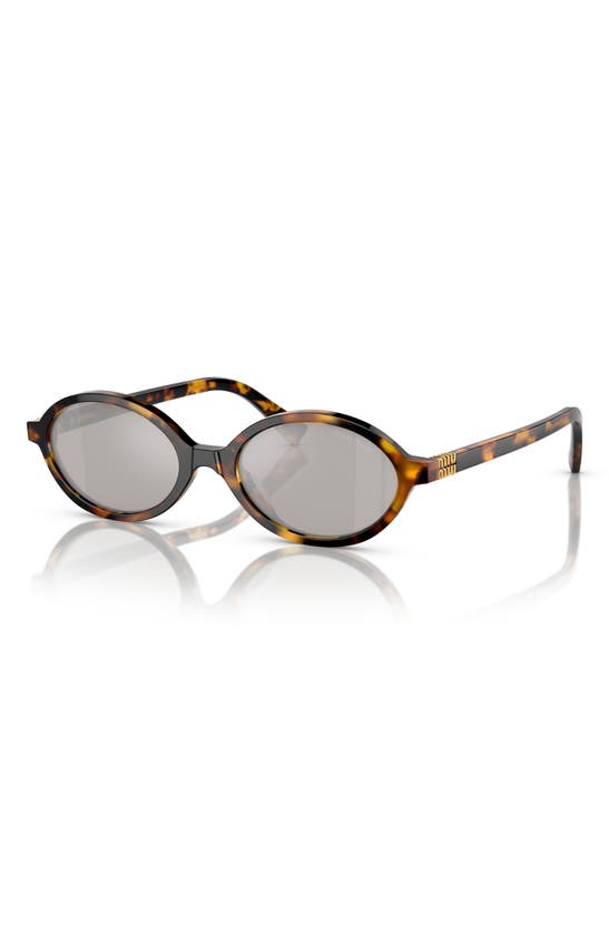 Shop Miu Miu 50mm Oval Sunglasses In Grey Mirror