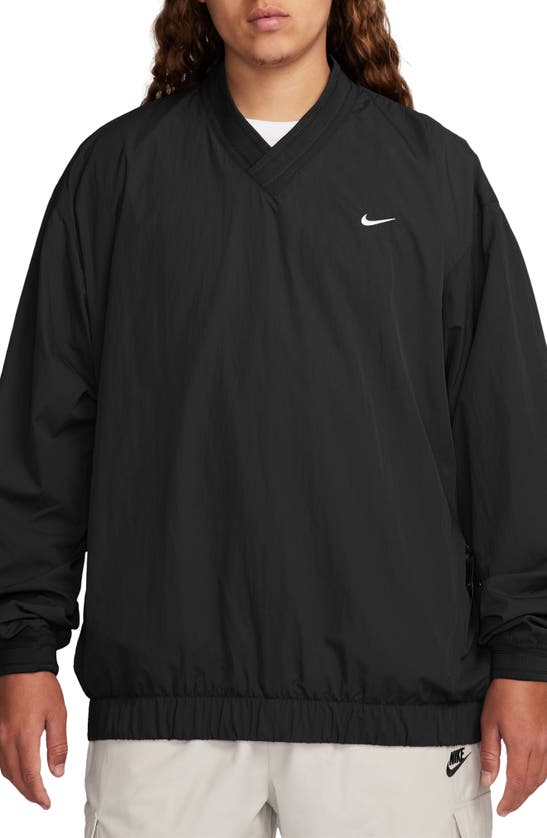 Shop Nike Solo Swoosh Wind Pullover Jacket In Black/ White