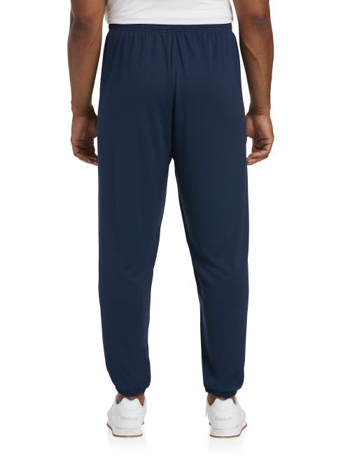 Shop Reebok Performance Jersey Elastic-hem Tech Pants In Navy