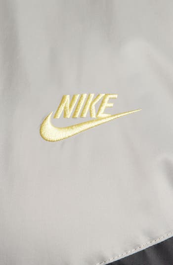 White and outlet gold nike windrunner