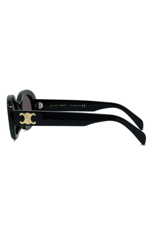 Shop Celine Triomphe 52mm Oval Sunglasses In Shiny Solid Black/smoke