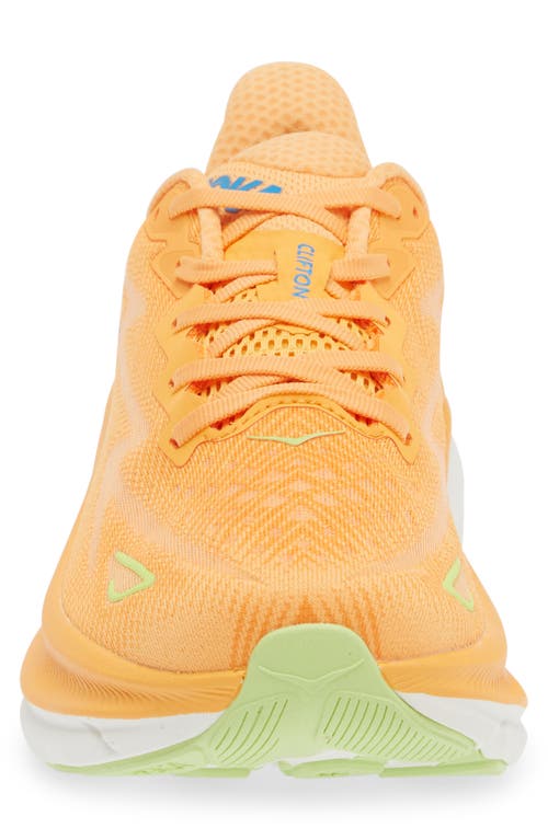 Shop Hoka Clifton 9 Running Shoe In Solar Flare/lettuce