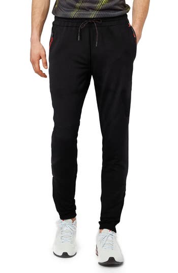 Shop X-ray Xray Zip Pocket Joggers In Black/red