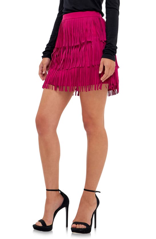 Shop Endless Rose Fringe Faux Suede Miniskirt In Berry