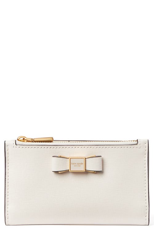 UPC 196021265587 product image for kate spade new york morgan bow small slim leather bifold wallet in Parchment. at | upcitemdb.com