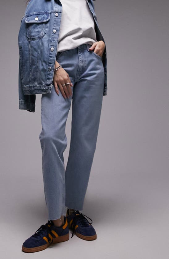 Shop Topshop Mid Rise Raw Hem Straight Leg Jeans In Light Blue