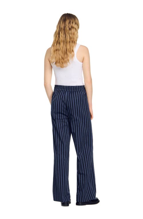 Shop Sandro Striped Trousers In Blue