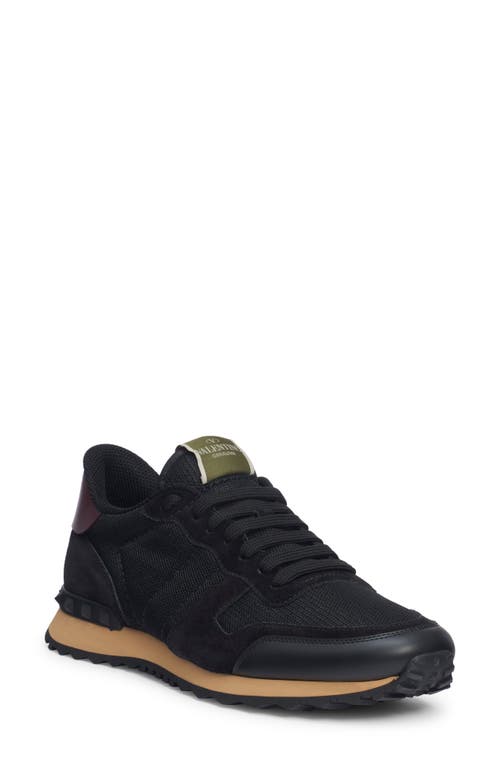 Shop Valentino Garavani Rockrunner Sneaker In Nero/nero-nero/nero-rubin