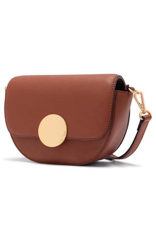 Shop Oryany Lottie Leather Saddle Crossbody Bag In Toffee Tan