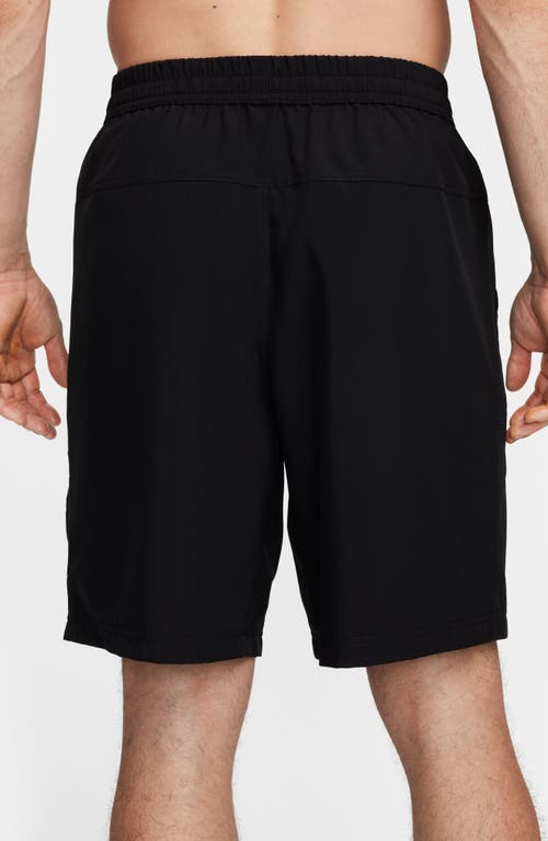 Shop Nike Form Dri-fit 9-inch Unlined Versatile Shorts In Black/white
