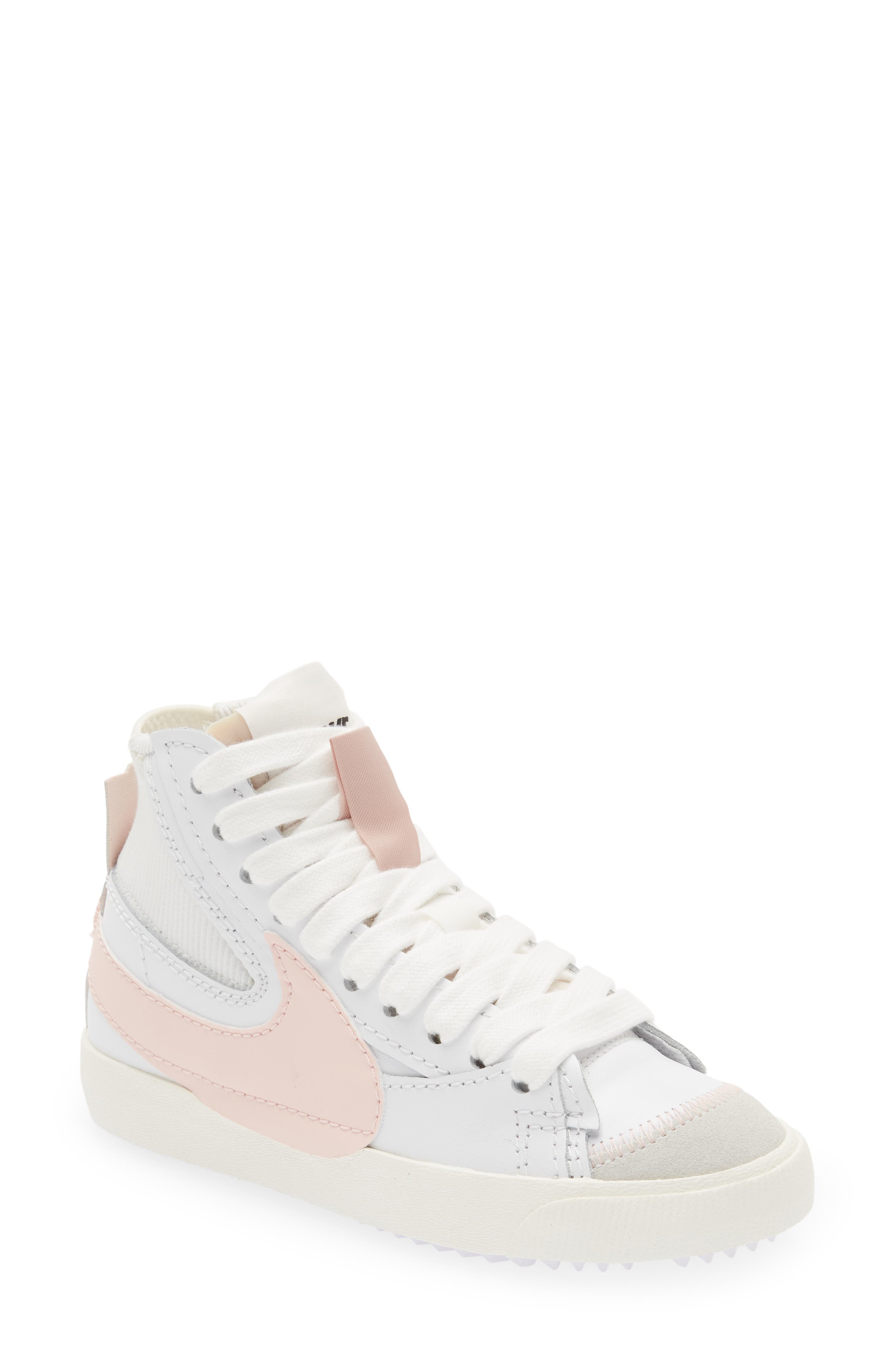 pink and white nike sneakers