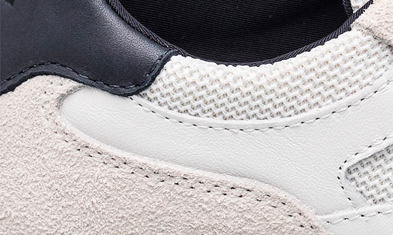 Shop Clae Zuma Sneaker In White Leather Navy