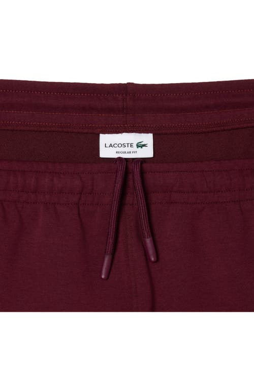 Shop Lacoste Knit Track Pants In Burgundy/anse