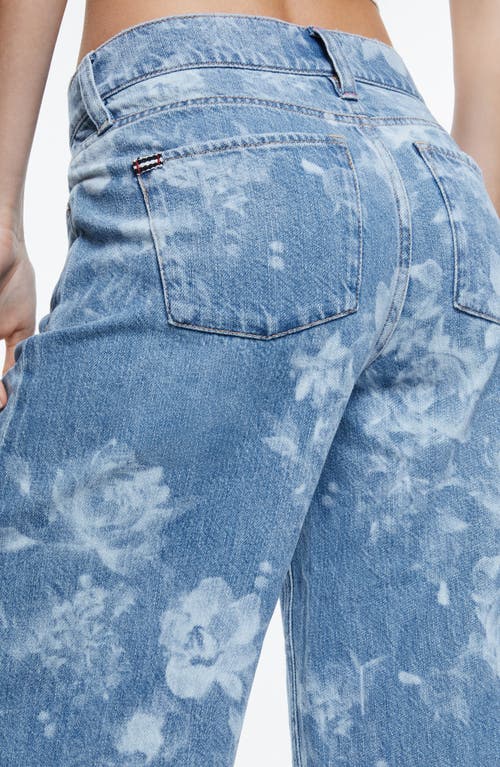 Shop Alice And Olivia Alice + Olivia Trish Low Rise Wide Leg Jeans In Lotus Floral